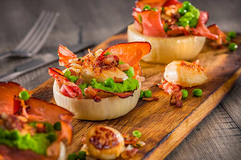 Jakobsmuschel im Serranoschinken