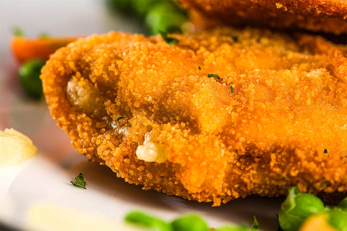 Kalbsschnitzel gefüllt mit Emmentaler und Kochschinken | Rezept