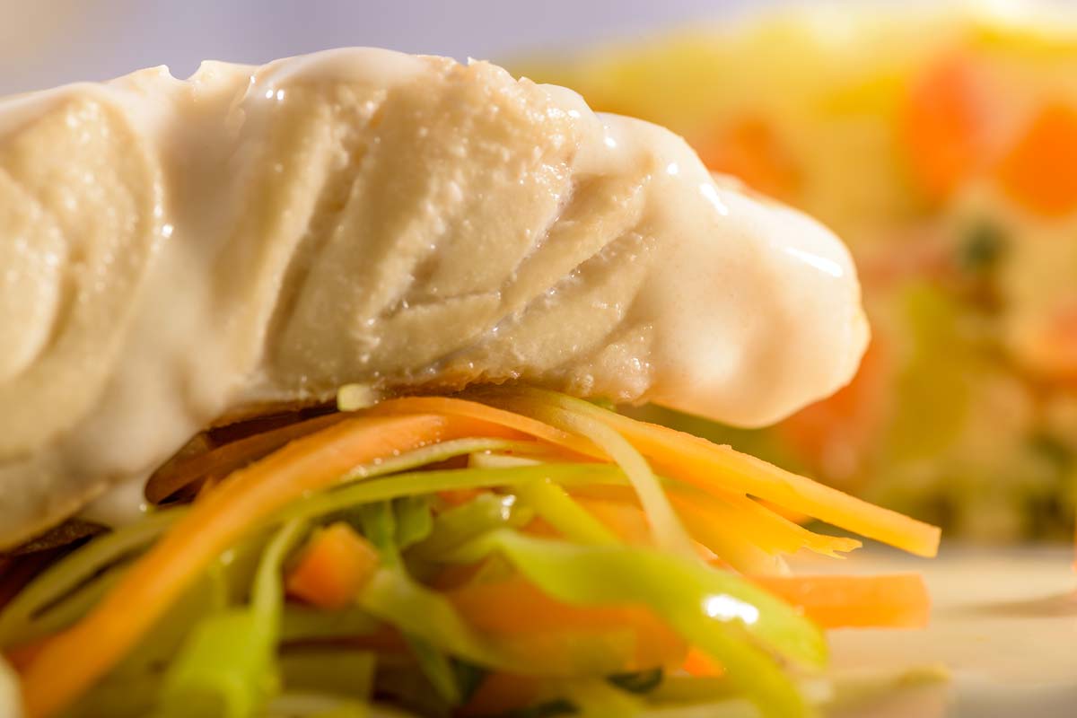 Gedunstetes Seelachsfilet In Weissweinsauce Mit Wirsingballchen Rezept