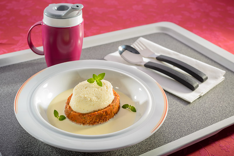 Hokifilet-Terrine auf mediterranem Gemüsepüree