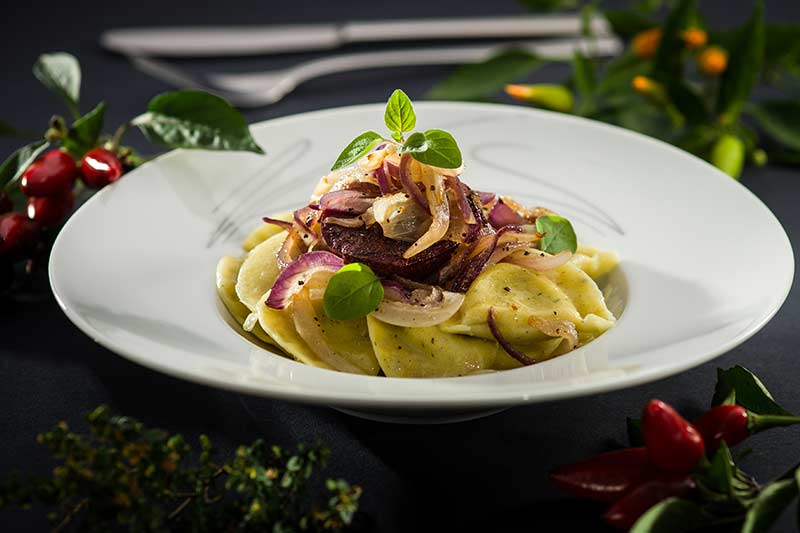 Blutwurst-Ravioli mit Zwiebelschmelze